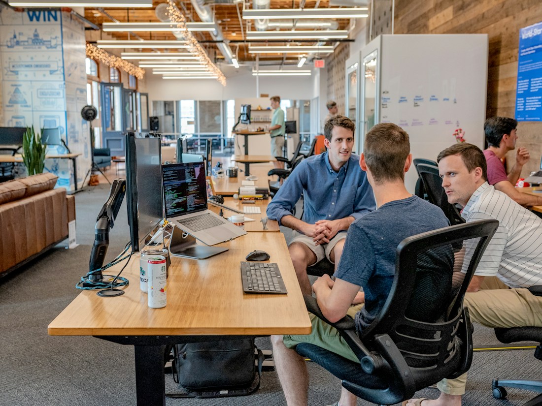 Cross-functional team reviewing a shared plan